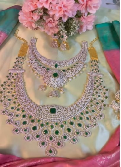 Diamond look statement necklace with Green stones. DM us for Combo
